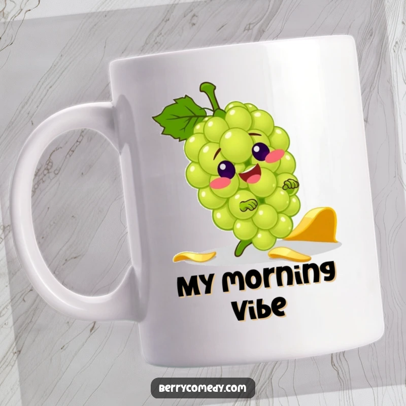 Funny mug showing a jolly green grape character comically tripping and falling over a yellow banana peel with a surprised expression.