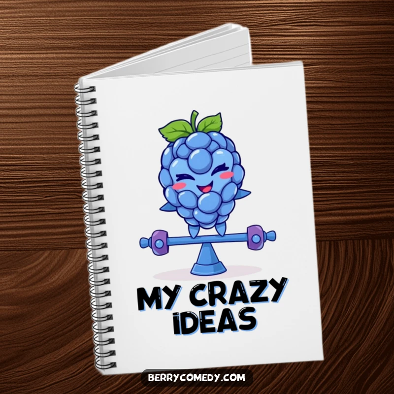 Funny notebook with a smiling blue raspberry character, winking mischievously while balancing on a teeter-totter, perfect for notes and ideas.